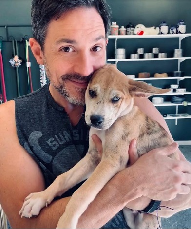 Steve and his pet dog, Cosmo